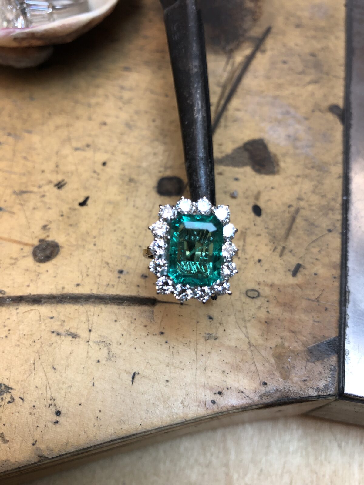 Setting an Emerald into a Diamond Halo by George Necula